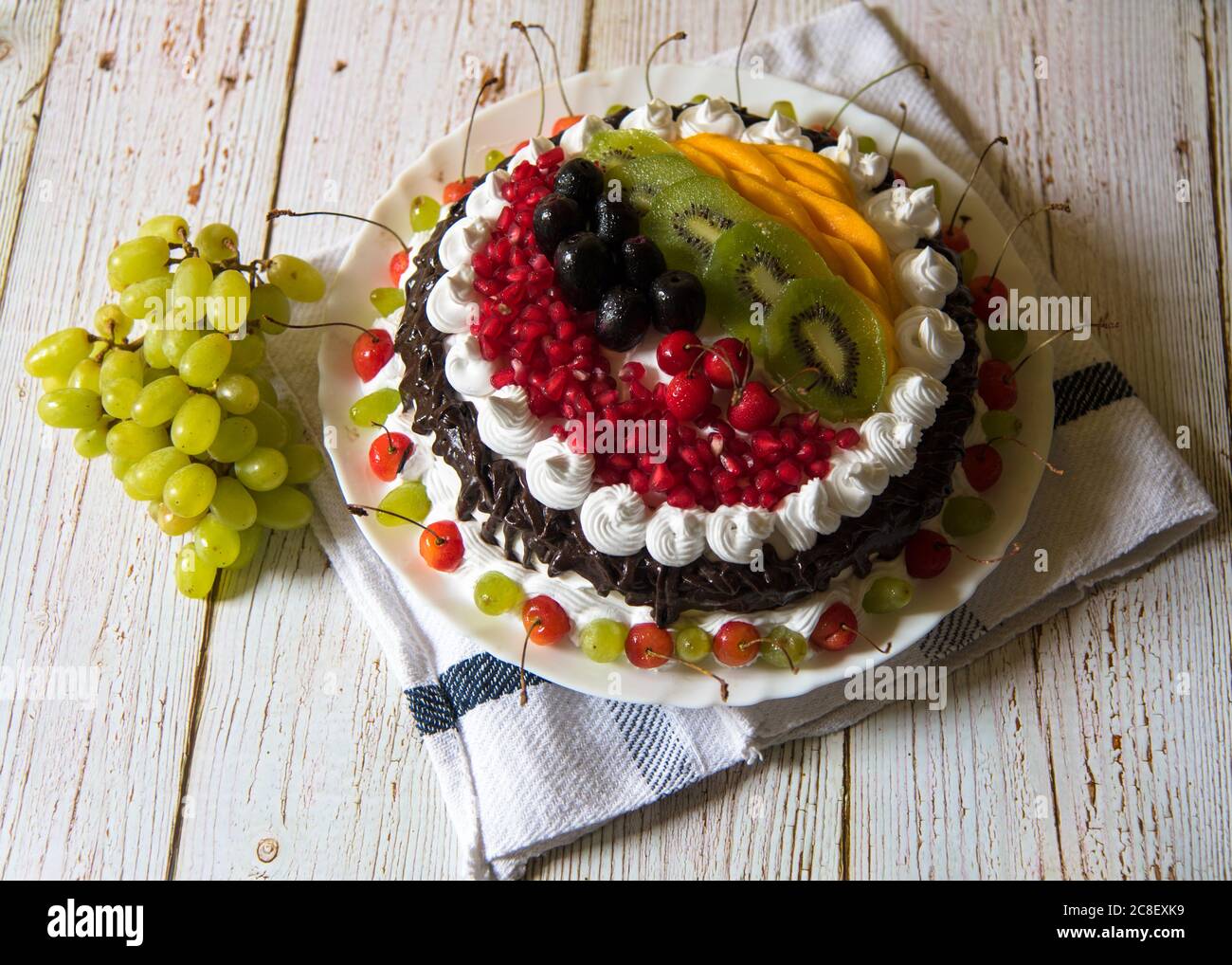 Obst und Desserts auf einem Hintergrund als Delikatesse dienen Stockfoto