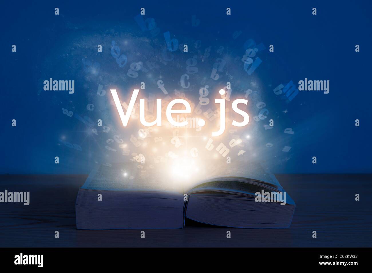 Vue.js lernen. Licht kommt aus offenem Buch mit Worten vue js. Bildungskonzept. Programmiersprache lernen Stockfoto