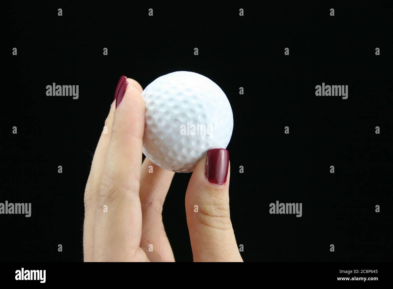 Bild von Golfball auf schwarzem Hintergrund. Stockfoto