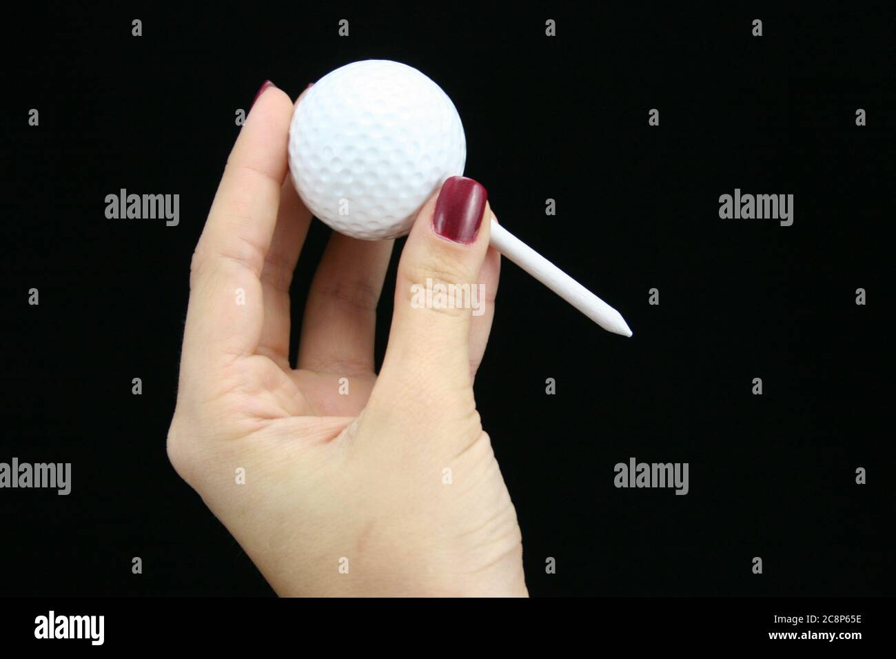 Bild von Golfball auf schwarzem Hintergrund. Stockfoto