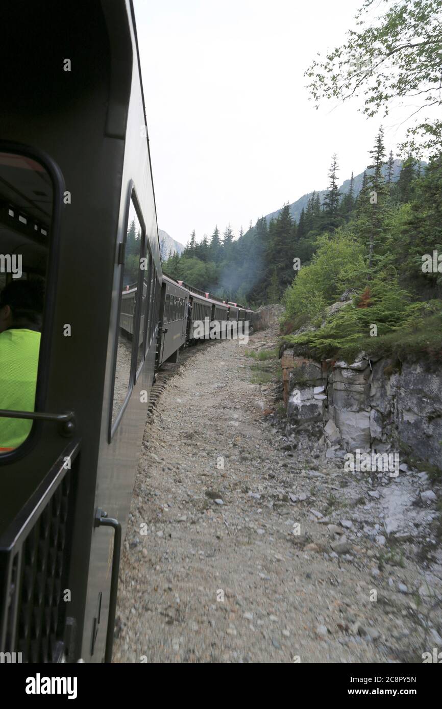 Alaskan Canadian White Pass Zugfahrt Attraktion durch british columbia canadian Rocky Mountains. Skagway, Alaska, USA Stockfoto