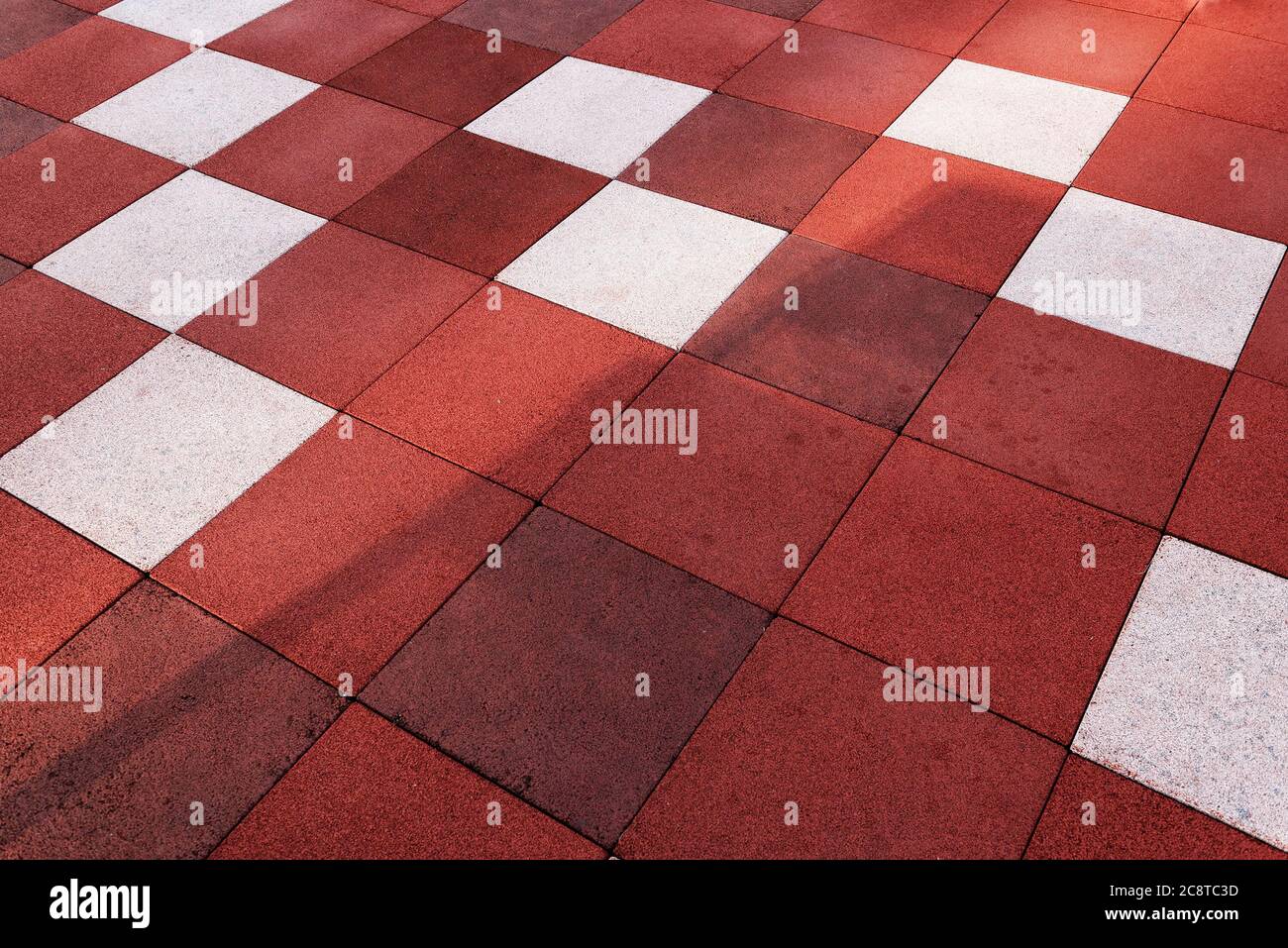 Hintergrund der roten und weißen quadratischen Pflaster Fliesen Stockfoto