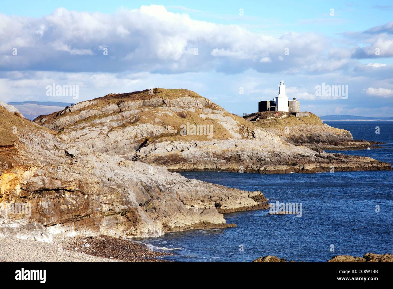 Murmbles Leuchtturm Bracelet Bay auf der Gower Peninsula West Glamorgan Wales Großbritannien ein beliebtes walisisches Küstenziel Reiseziel Wahrzeichen für t Stockfoto