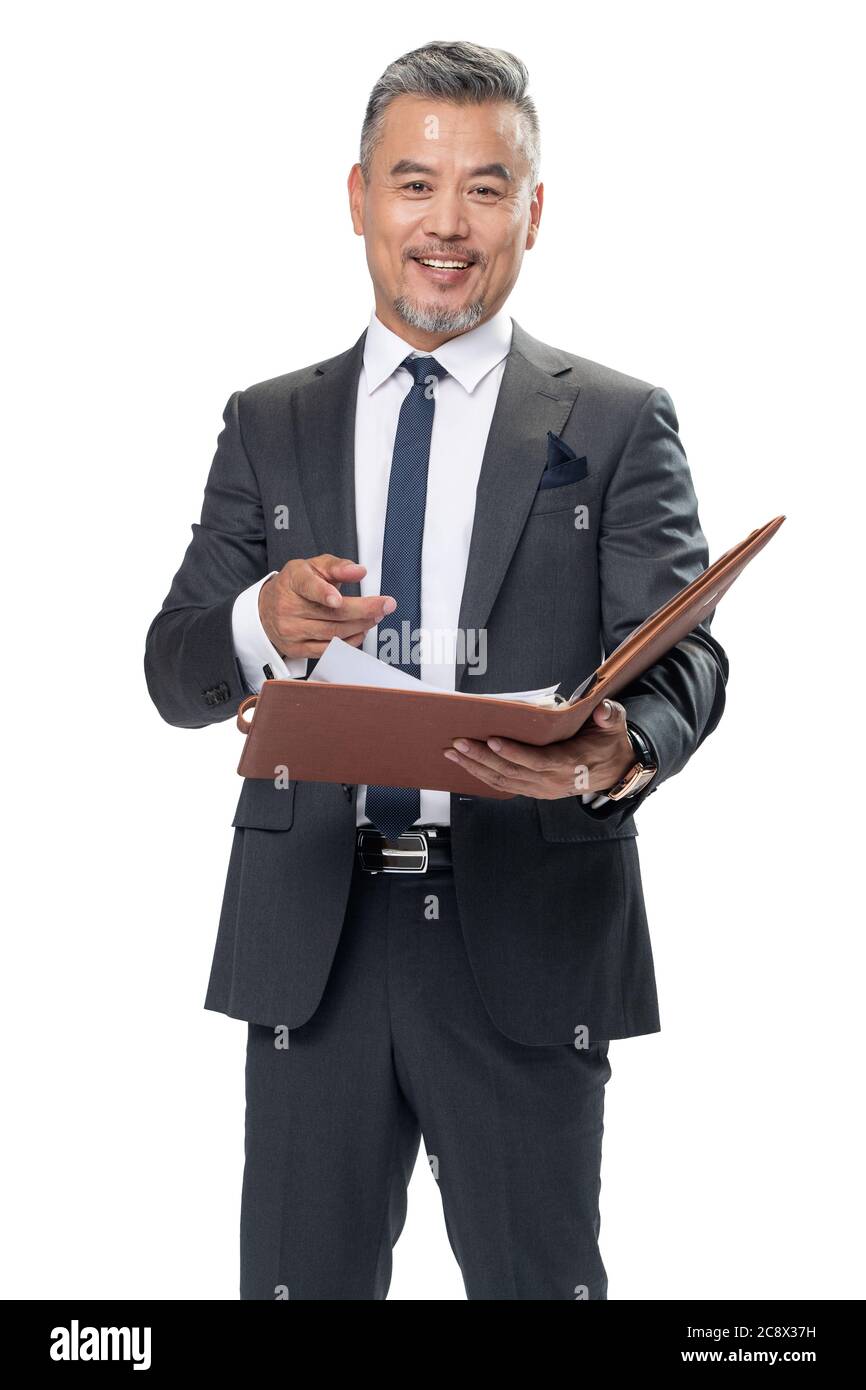 Ein Geschäftsmann mittleren Alters mit einem Notebook Stockfoto