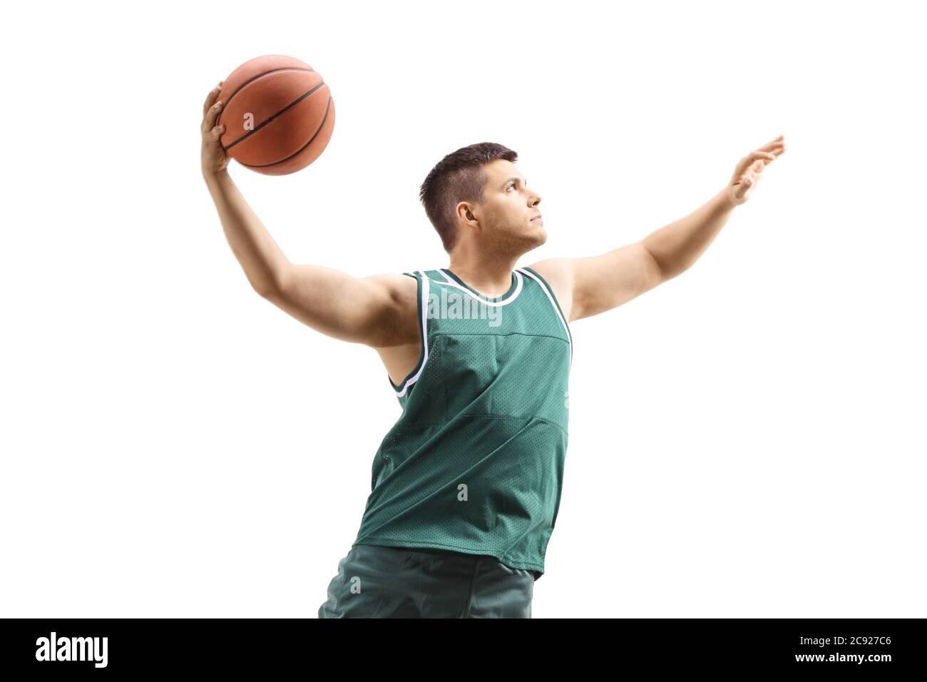 Männliche Basketballspieler in Aktion mit einem Ball Durchführung Slam Dunk isoliert auf weißem Hintergrund Stockfoto