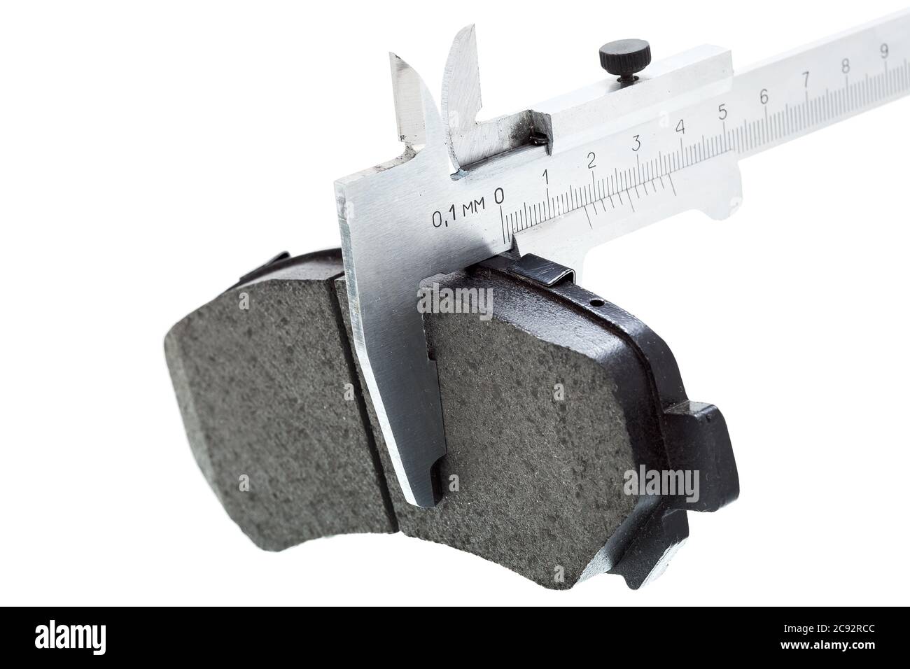 Bremsbeläge, Messung durch einen Bremssattel der Dicke Auto-Ersatzteil, isoliert niemand. Stockfoto