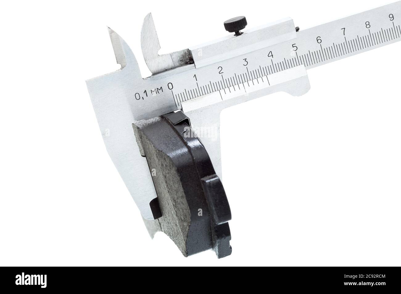 Bremsbeläge, Messung durch einen Bremssattel der Dicke Auto-Ersatzteil, isoliert niemand. Stockfoto