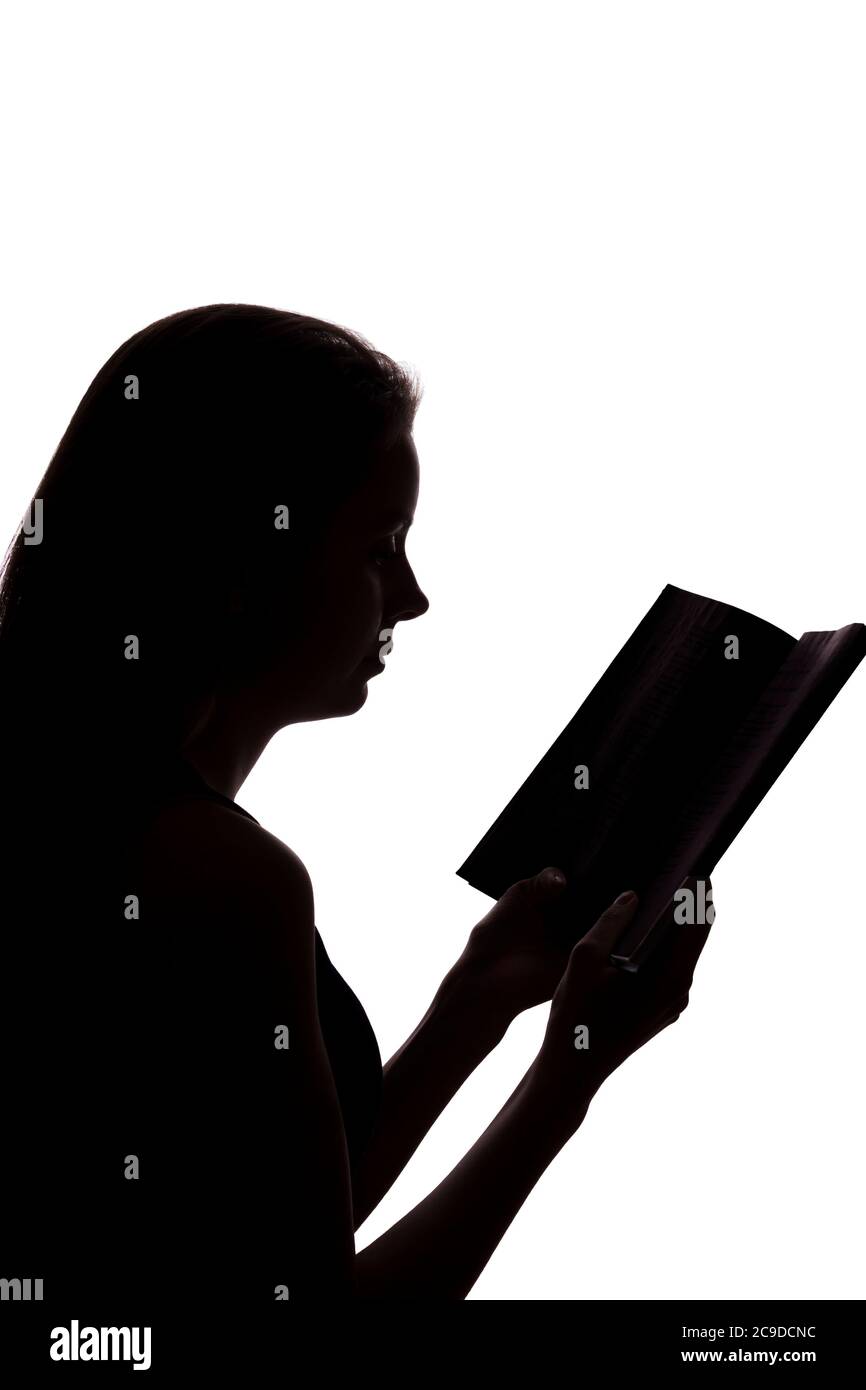 Mädchen lesen ein Buch - Silhouette, isolieren Stockfoto