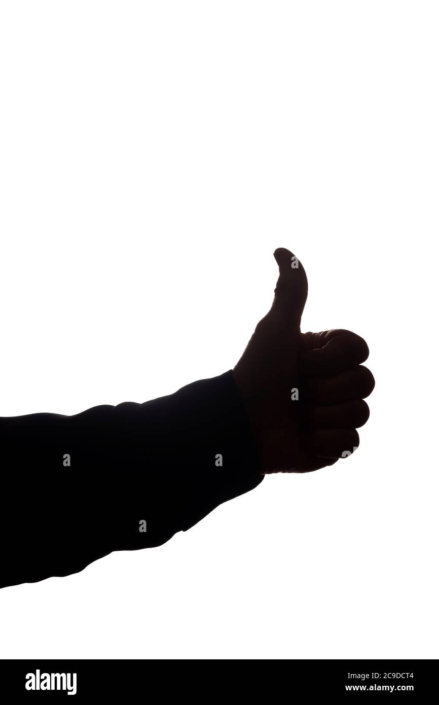 Hand eines alten Mannes mit erhobenem Finger, wie und Zustimmung - Silhouette Konzept Abstraktion Stockfoto