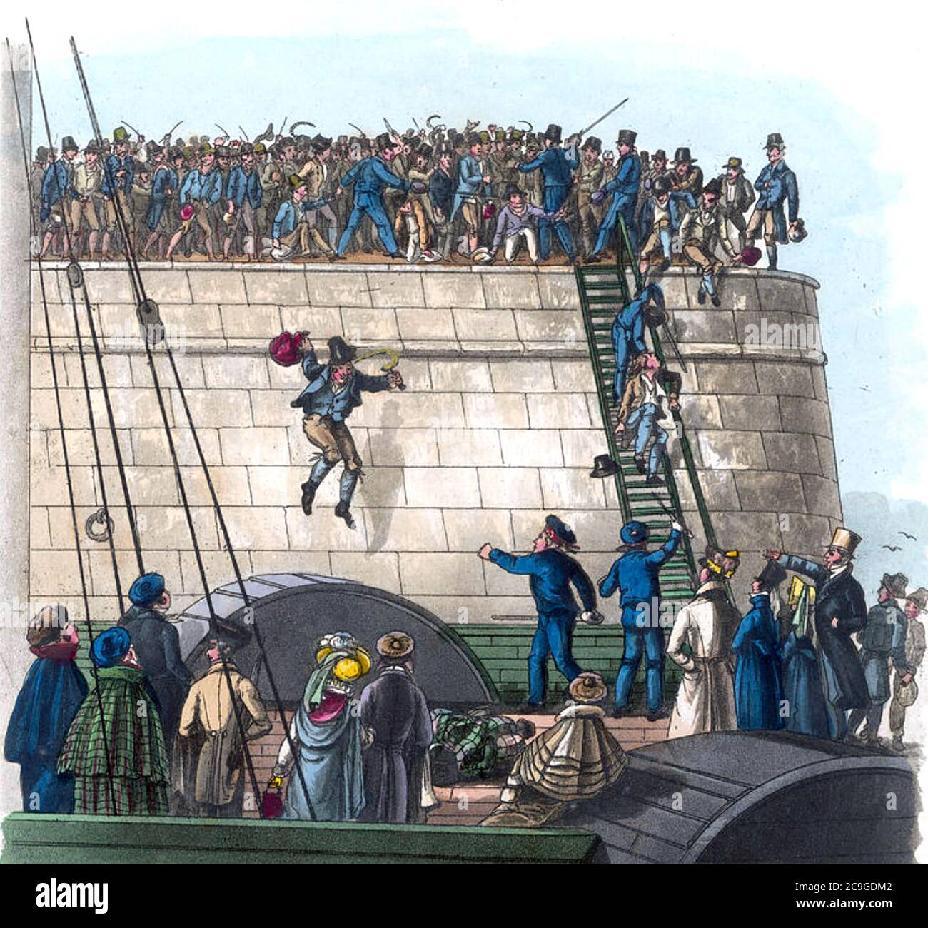 IRISCHE LANDARBEITER im Jahr 1825, viele mit Sicheln, joggen am Pier, um das Holyhead-Dublin-Schiff nach ihrer Saisonarbeit in England für ihre Rückreise zu besteigen. Stockfoto