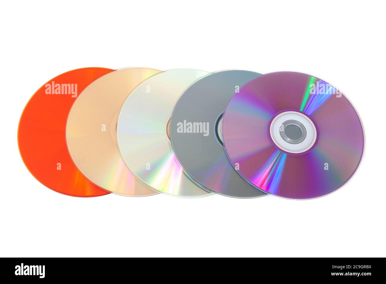 Mehrere mehrfarbige CDs auf weißem Hintergrund Stockfoto