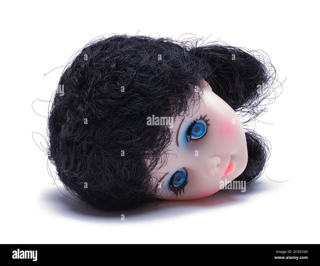 Spielzeug Baby Puppe Kopf isoliert auf weißem Hintergrund. Stockfoto