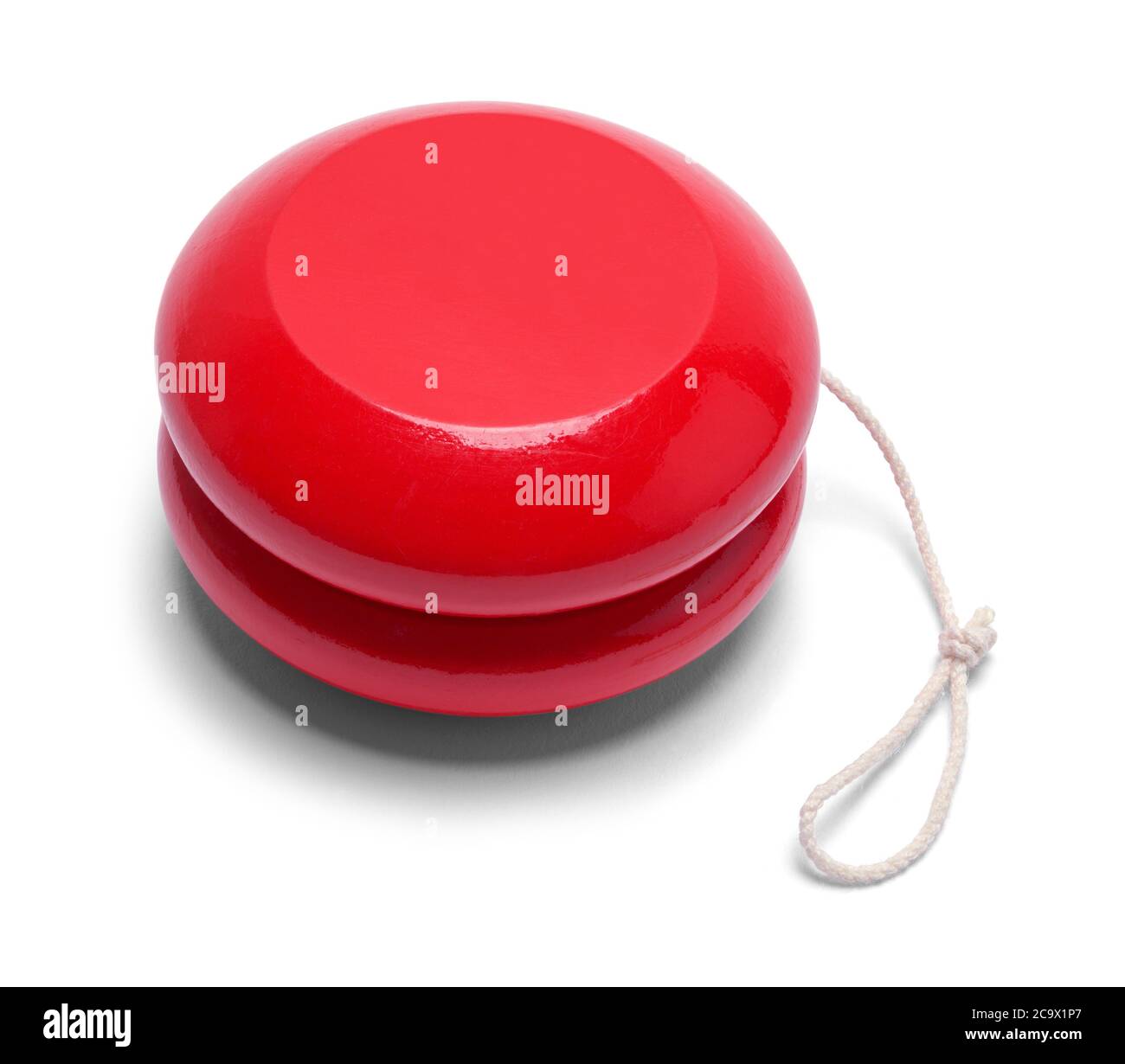 Rotes Holz Yo-yo isoliert auf weißem Hintergrund. Stockfoto