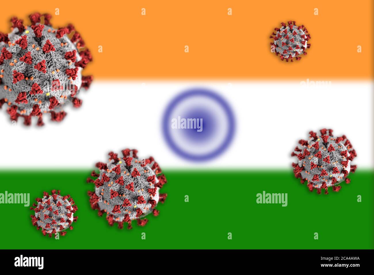 Konzept von Coronavirus oder Covid-19 Partikeln überschattet verschwommene Flagge Indiens im Hintergrund. Stockfoto