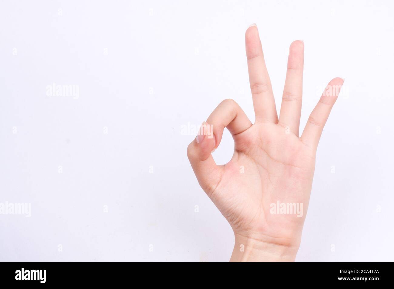 Finger Hand Symbole isoliert das Konzept Hand gestikulieren Zeichen ok okay auf weißem Hintergrund zustimmen Stockfoto