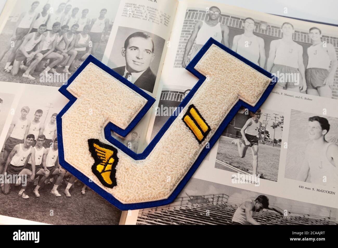 Still Life 1960s High School Athletic Letter on Class Yearbook, USA Stockfoto