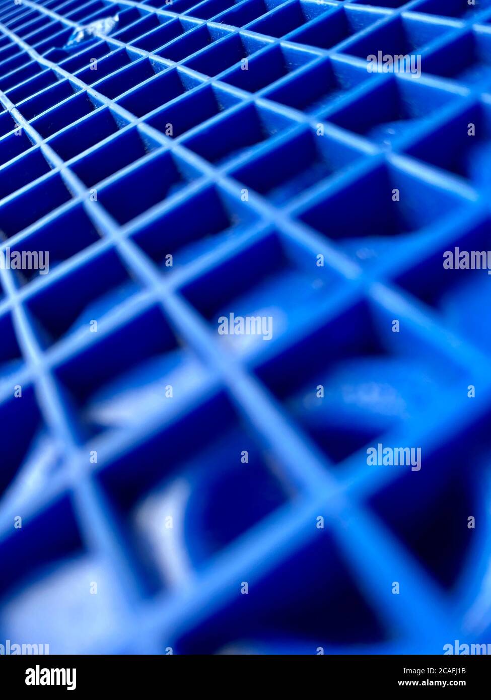 Textur aus blauem Kunststoff Nahaufnahme, abstrakter Hintergrund Stockfoto
