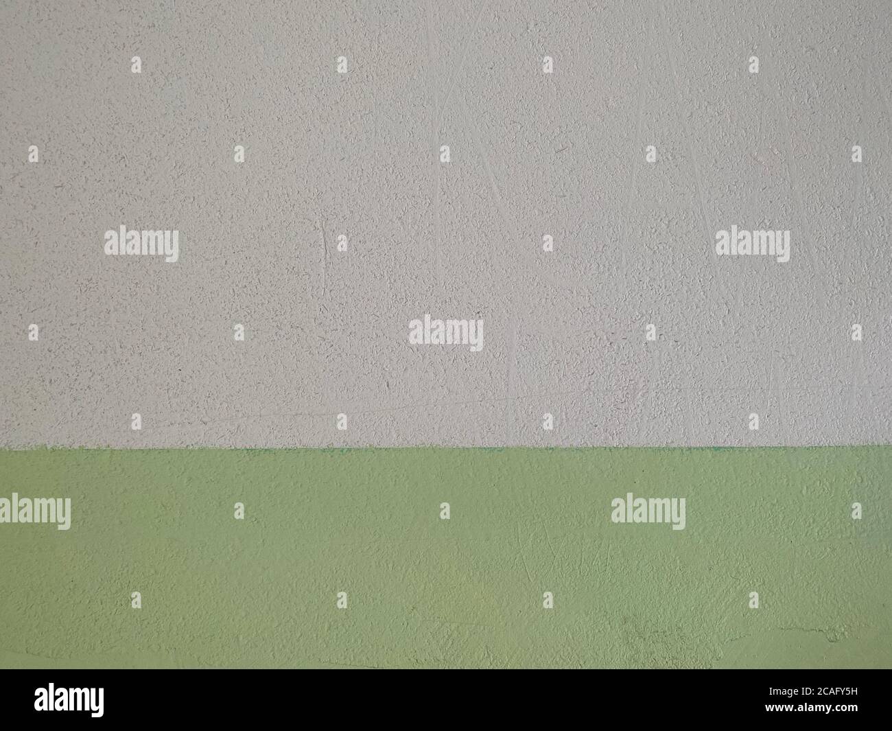 Nahtlose Wandstruktur, weiße und grüne Farbe Stockfoto