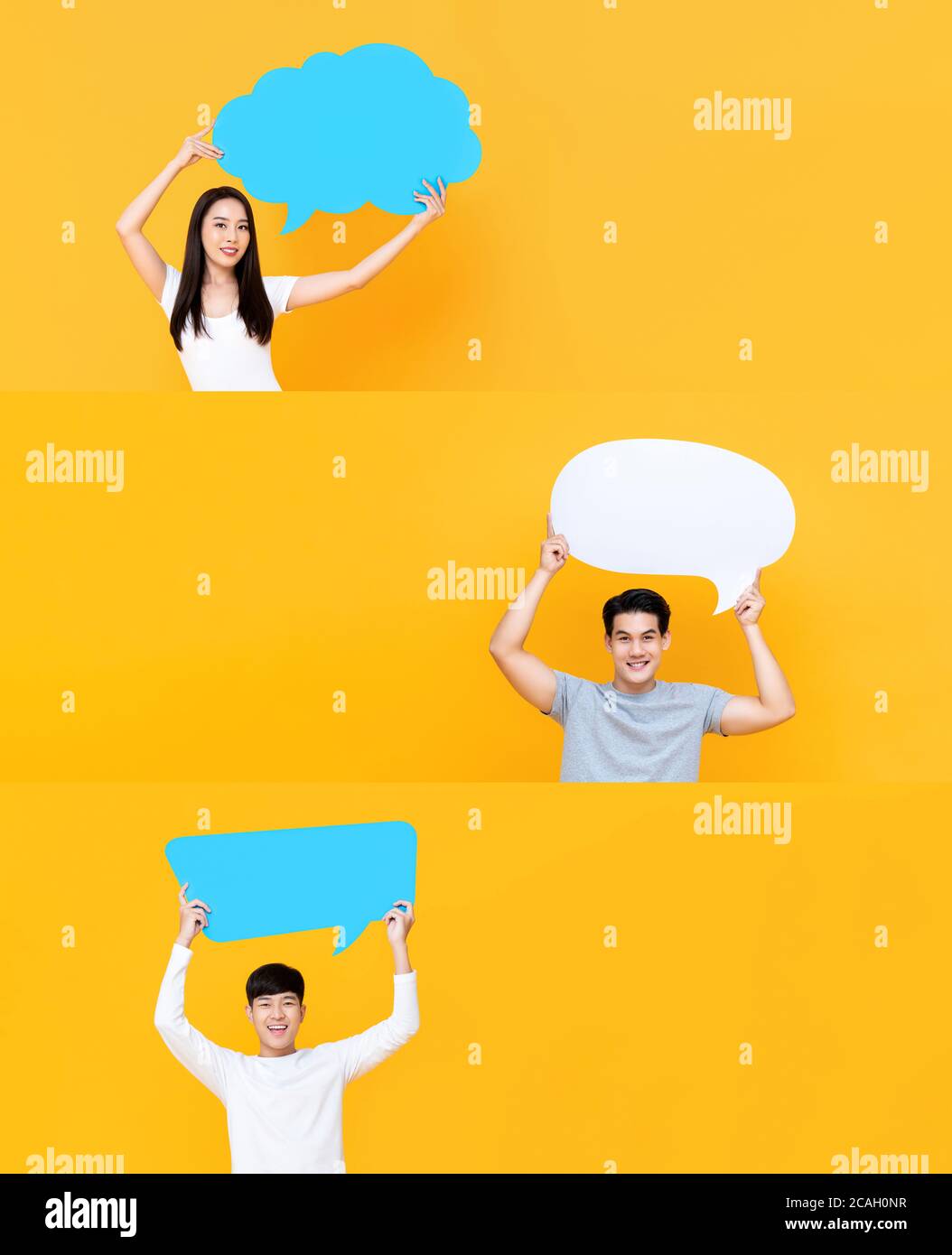 Gruppe von glücklich lächelnden asiatischen Männern und Frauen halten Rede Blasen mit leeren Leerzeichen für Text auf isolierten gelben Studio Hintergrund Stockfoto