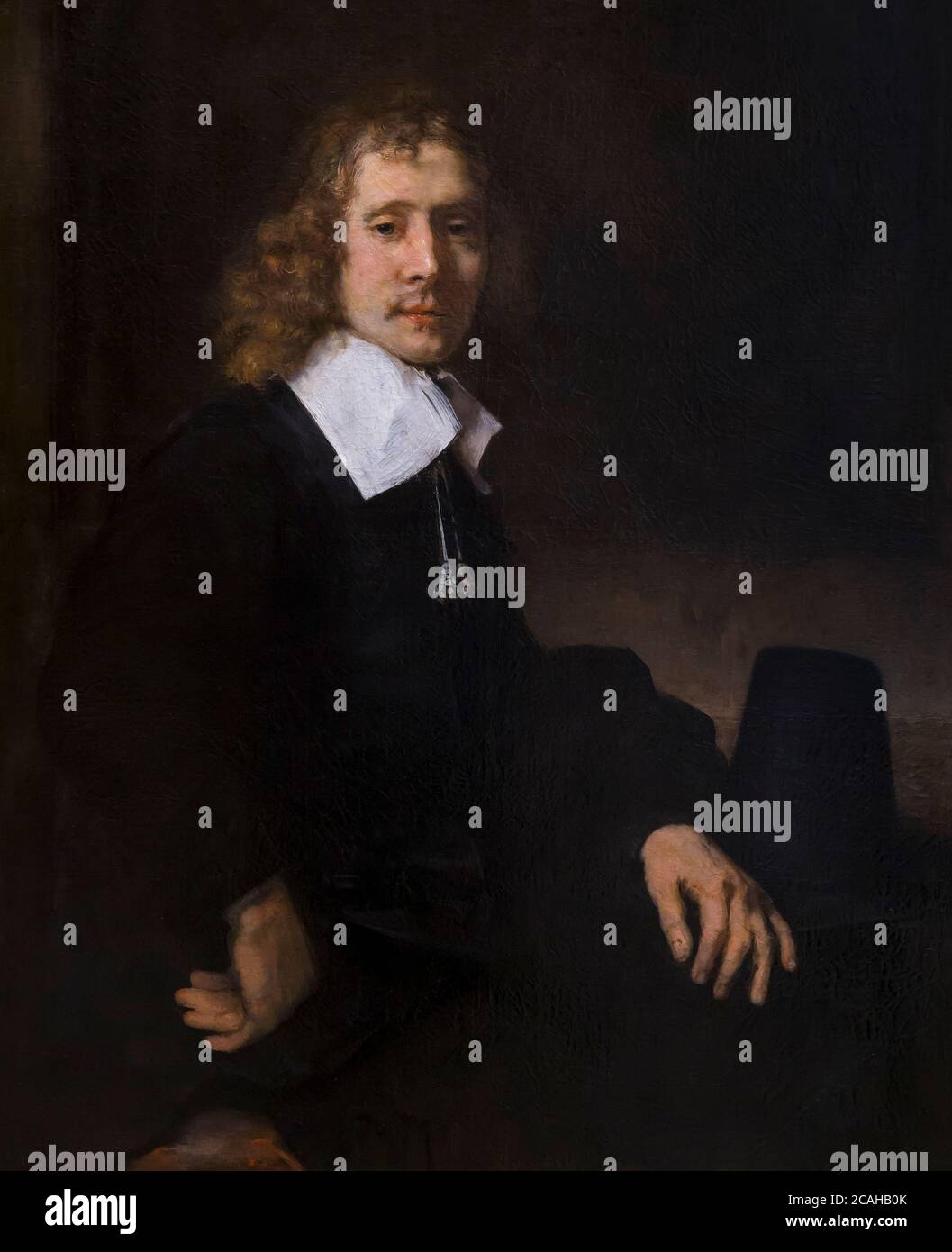 Ein junger Mann an einem Tisch sitzend, möglicherweise Govaert Flinck, Rembrandt, um 1660, National Gallery of Art, Washington DC, USA, Nordamerika Stockfoto