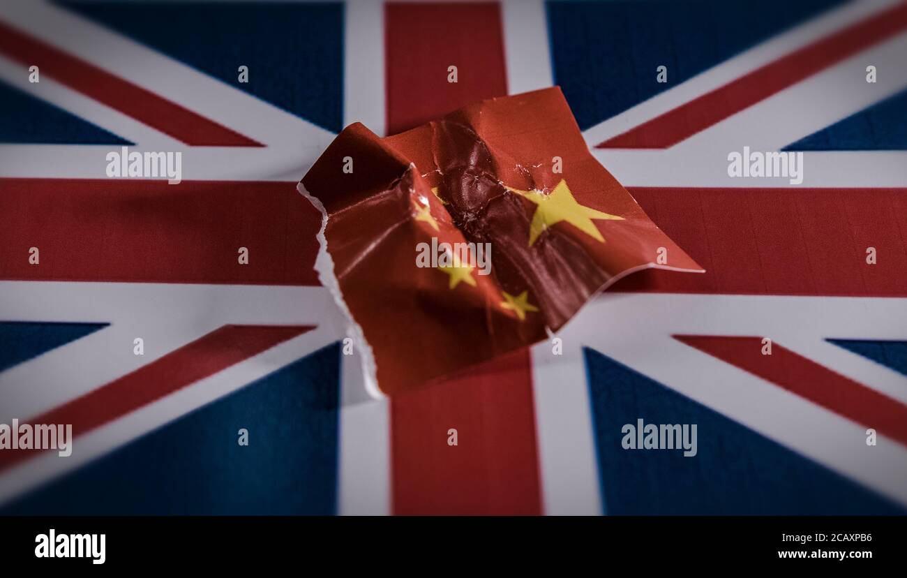 Zerknittertes chinesisches Symbol auf der Flagge des Vereinigten Königreichs. Stockfoto