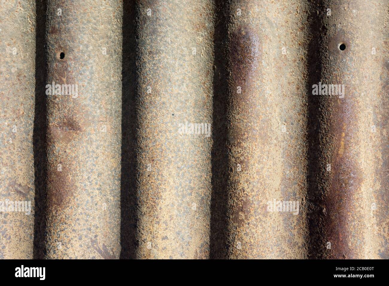 Metallhintergrundstruktur Nahaufnahme mit abstrakten Linien und einer gesprenkelten, malerischen Technik. Stockfoto