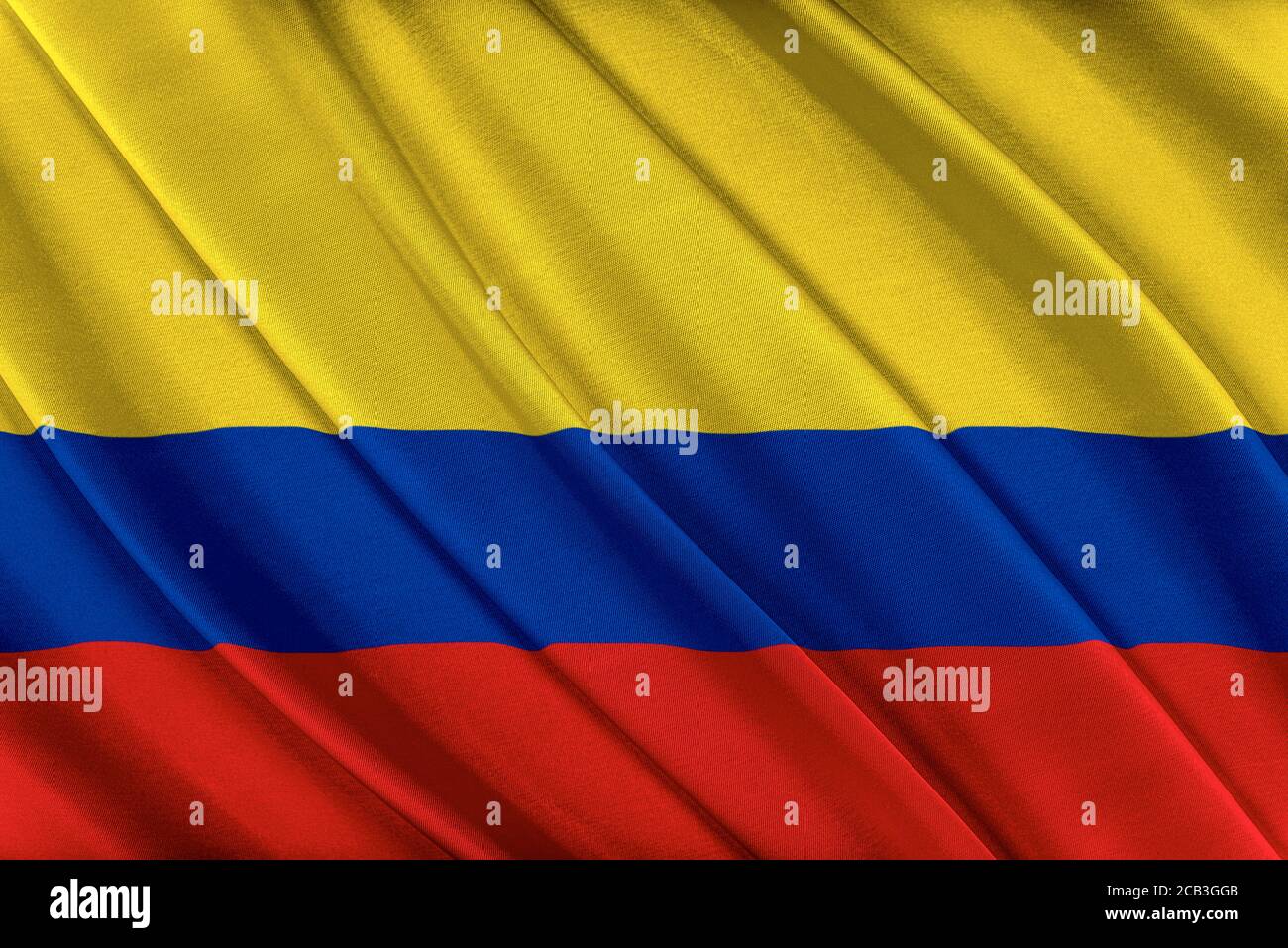 Bunte kolumbianische Flagge winkt im Wind. Stockfoto