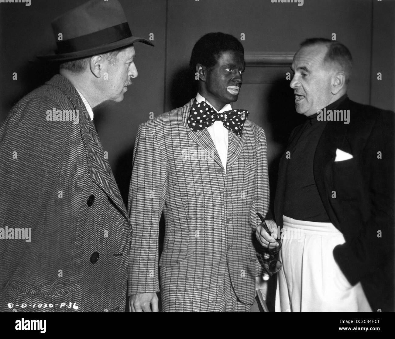 Regisseur ALFRED E. GREEN LARRY PARKT in Blackface als Al Jolson und AL JOLSON am Set offen während der Dreharbeiten ZUR JOLSON STORY 1946 Columbia Pictures Stockfoto