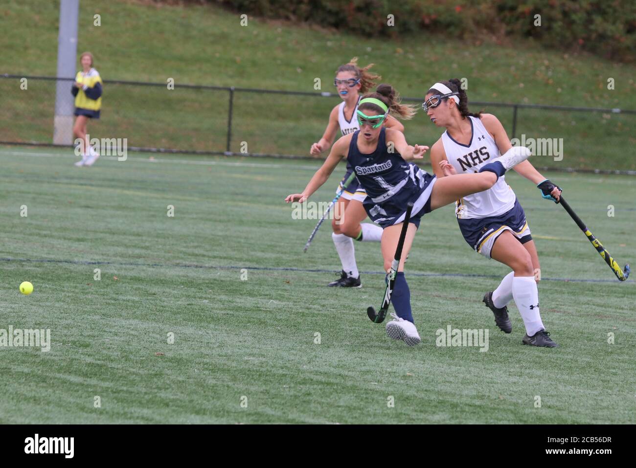 Field Hockey ist ein Sport voller Action. Stockfoto