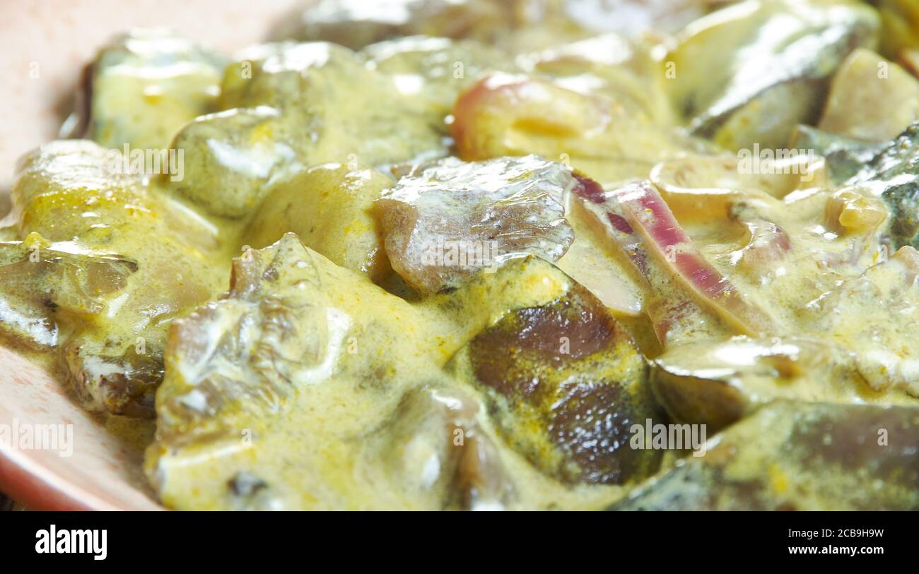 Pilzperatal, Omas Pilz Dry Curry, indische Art Rührpilze gebraten Stockfoto