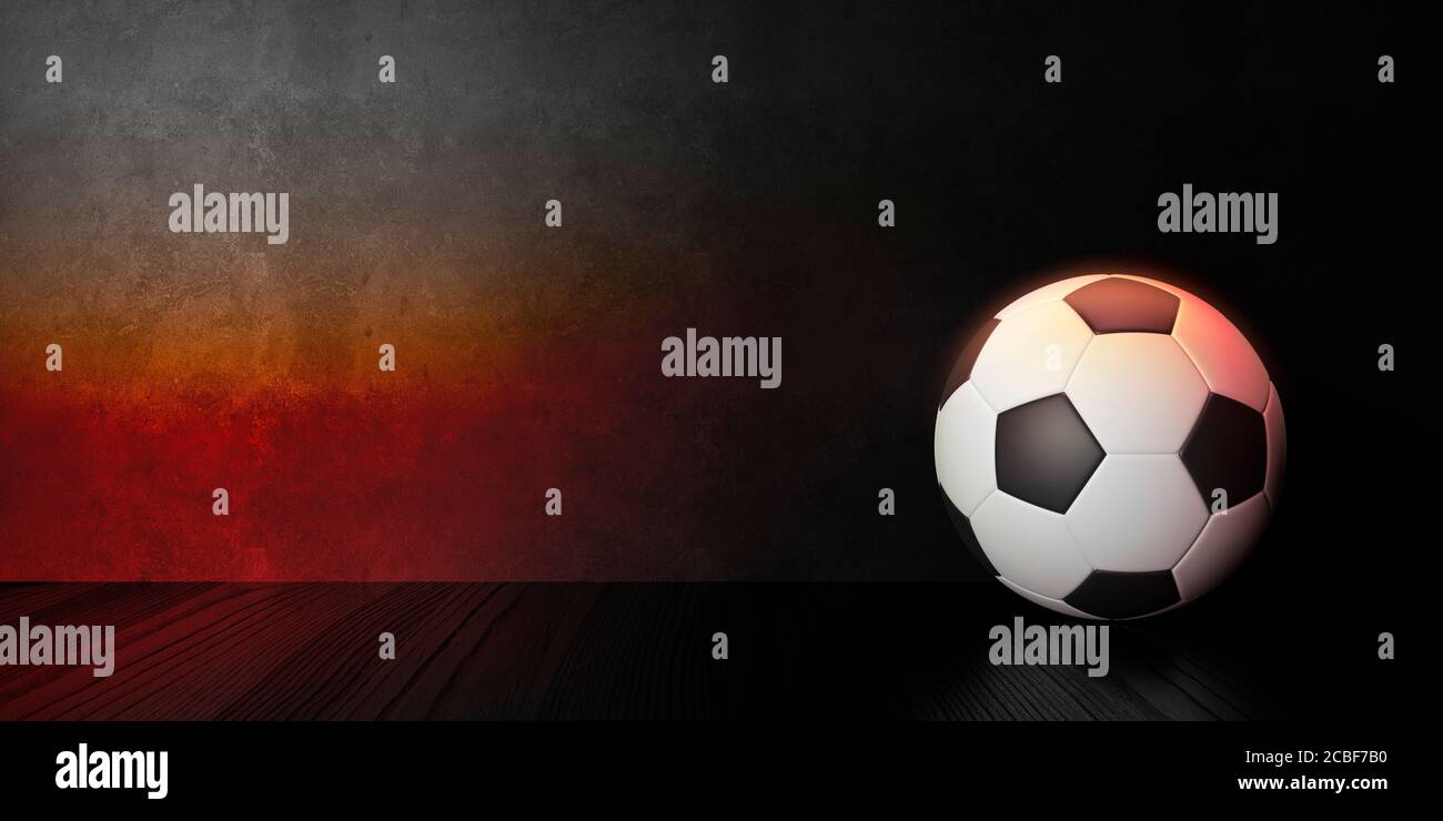 Fußball auf dunklem Raum Hintergrund Stockfoto