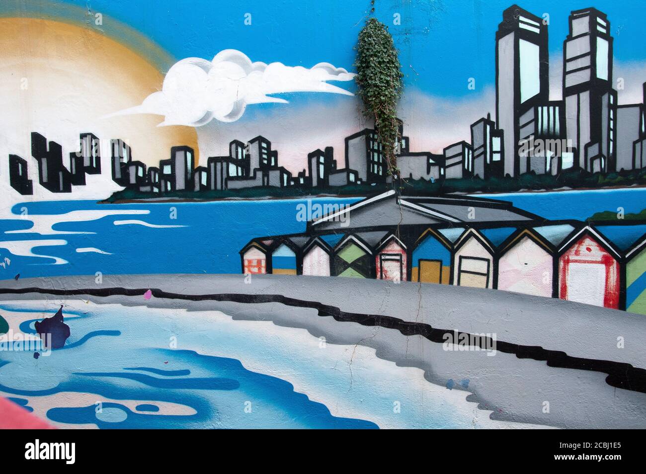 Street Art Wandgemälde mit Badekisten am Middle Brighton Beach, Melbourne, Australien Stockfoto