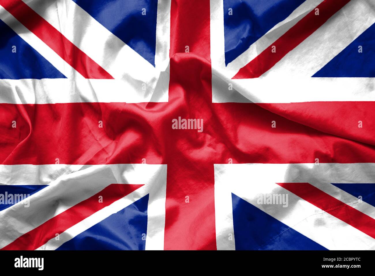 Britische Flagge Hintergrund winken mit Stoff Textur, Union Jack. Stockfoto