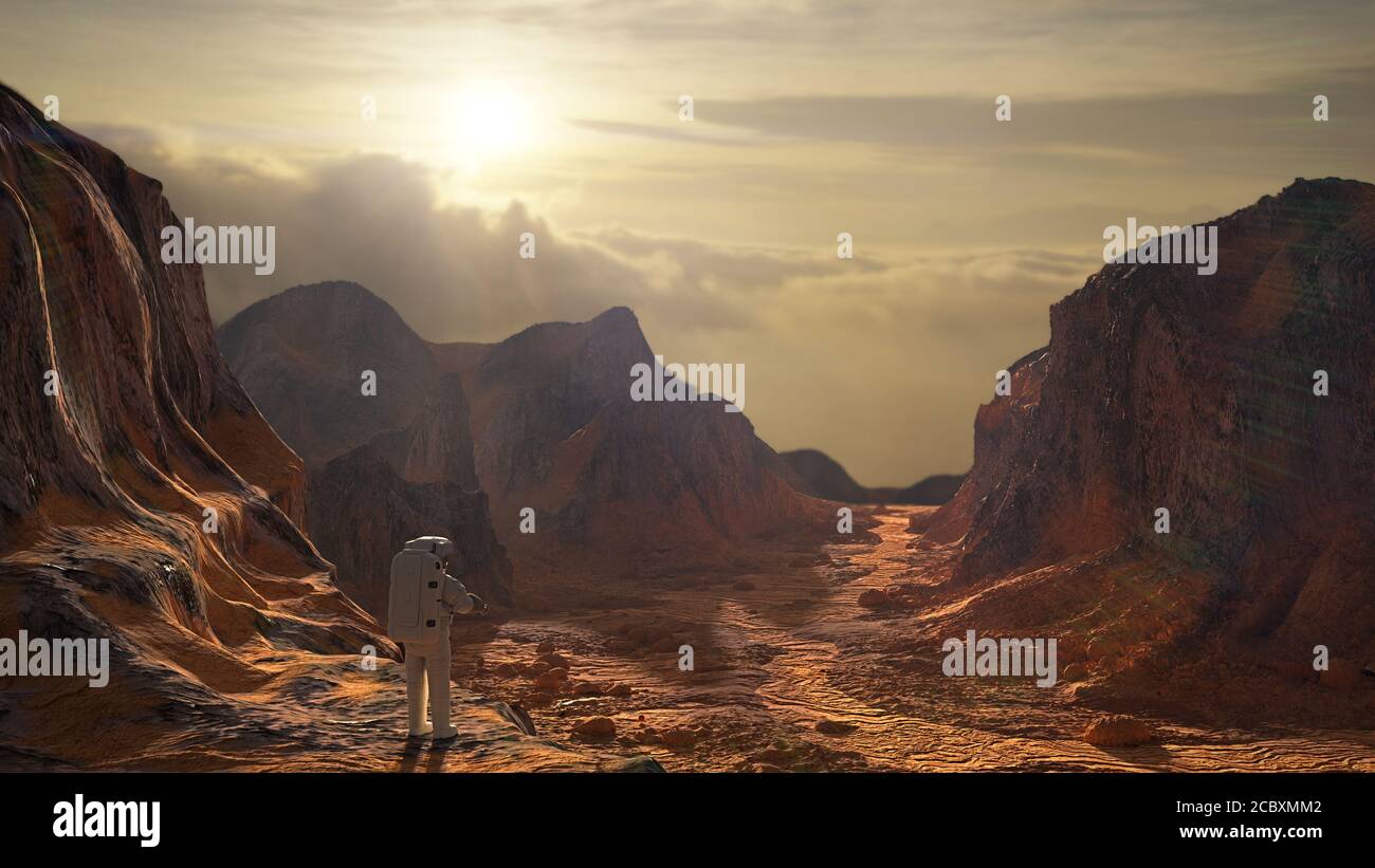 Astronaut auf dem Planeten Mars Beobachten der aufgehenden Sonne Stockfoto