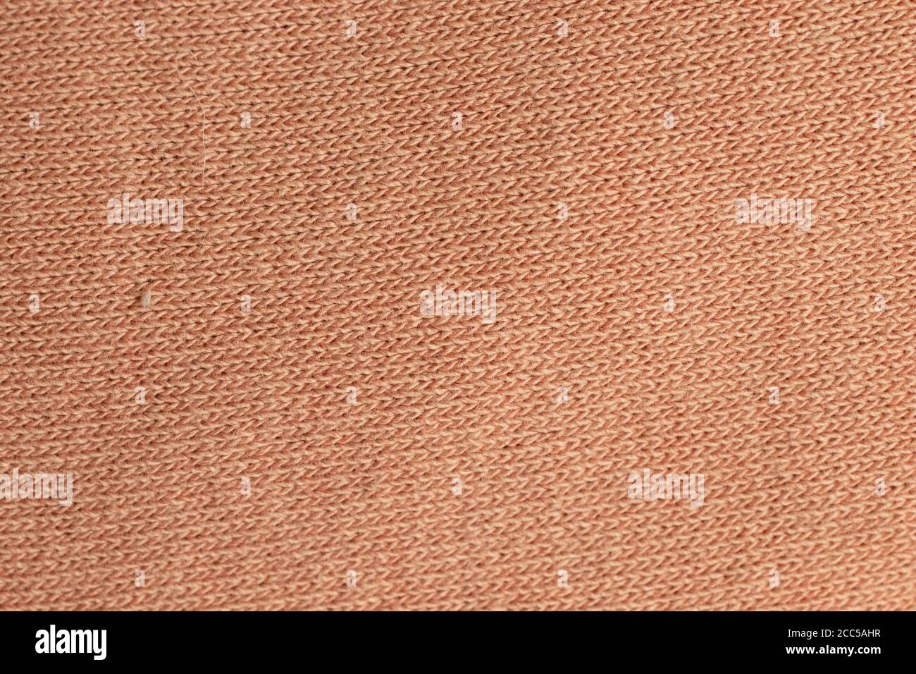 Hellrosa glatte Textilstruktur Stockfoto