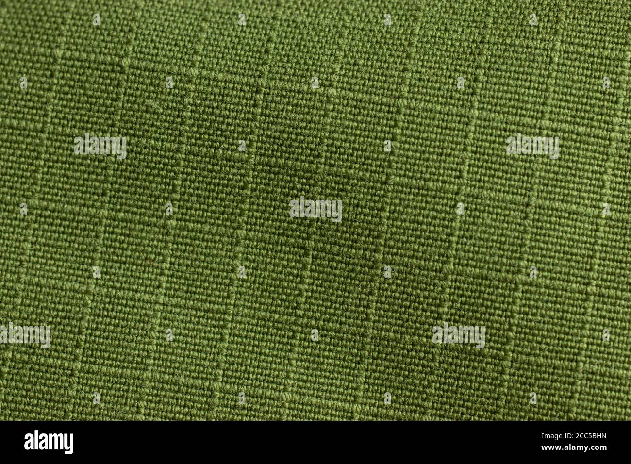 Hintergrund der grünen Gitterstruktur. Makro für Gewebematerial Stockfoto