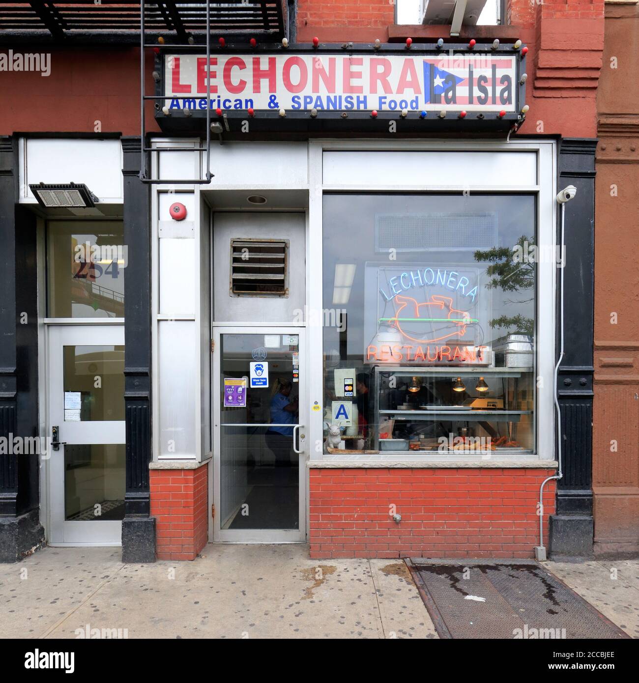Lechonera La Isla, 254 E 125. St, New York, NYC Foto von einem Puerto-ricanischen Restaurant im East Harlem-Viertel von Manhattan. Stockfoto