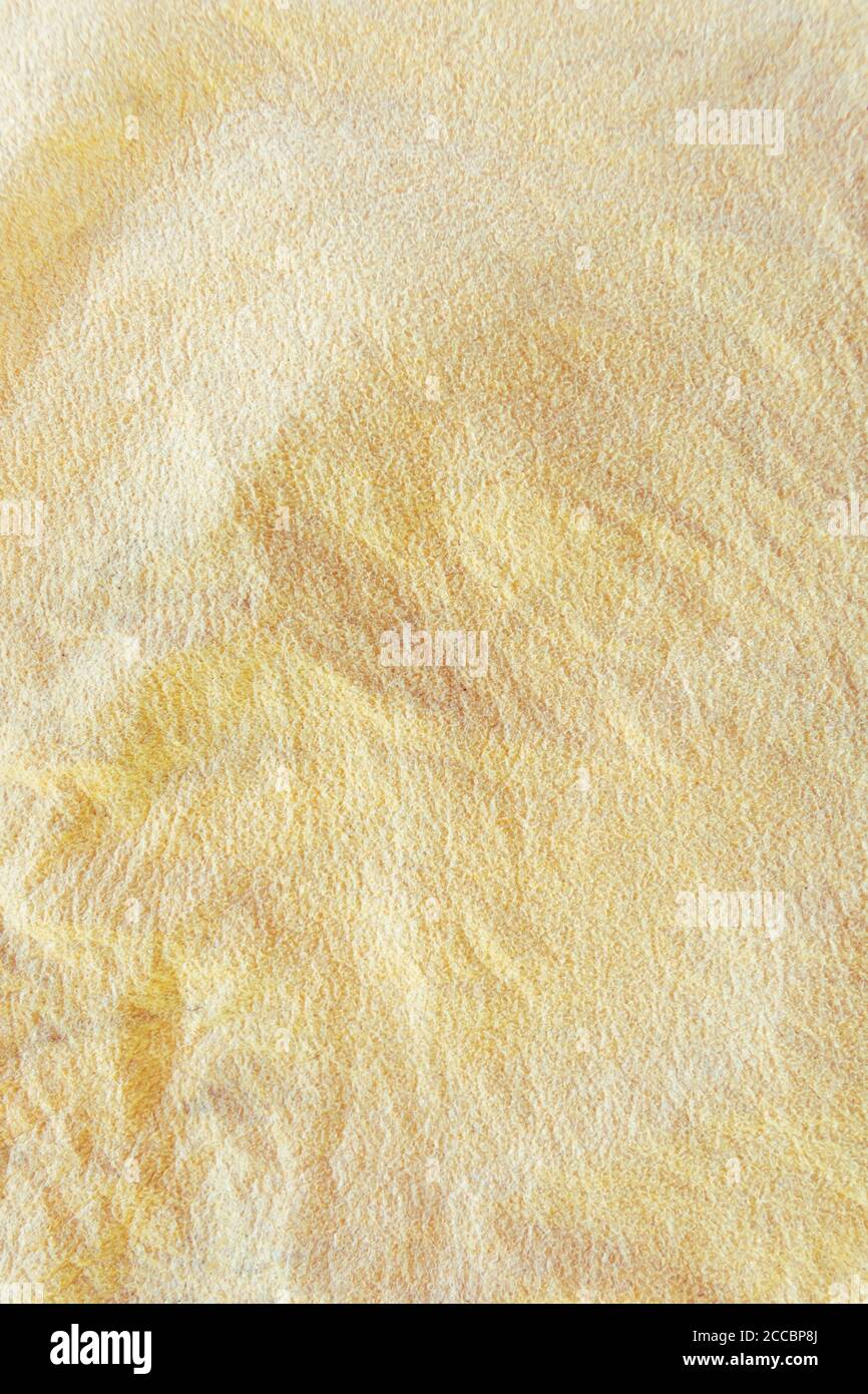 Textur aus natürlichem gelbem Textilgewebe. Leinwandmaterial. Stockfoto
