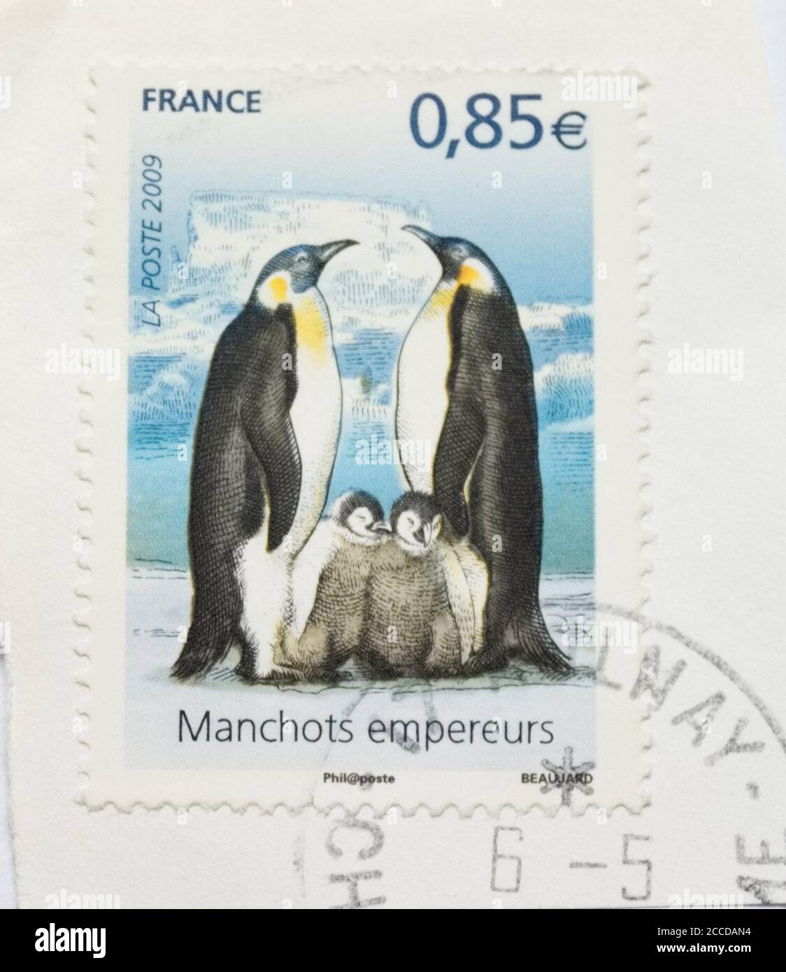 Briefmarke von Frankreich mit Kaiserpinguinen Stockfoto