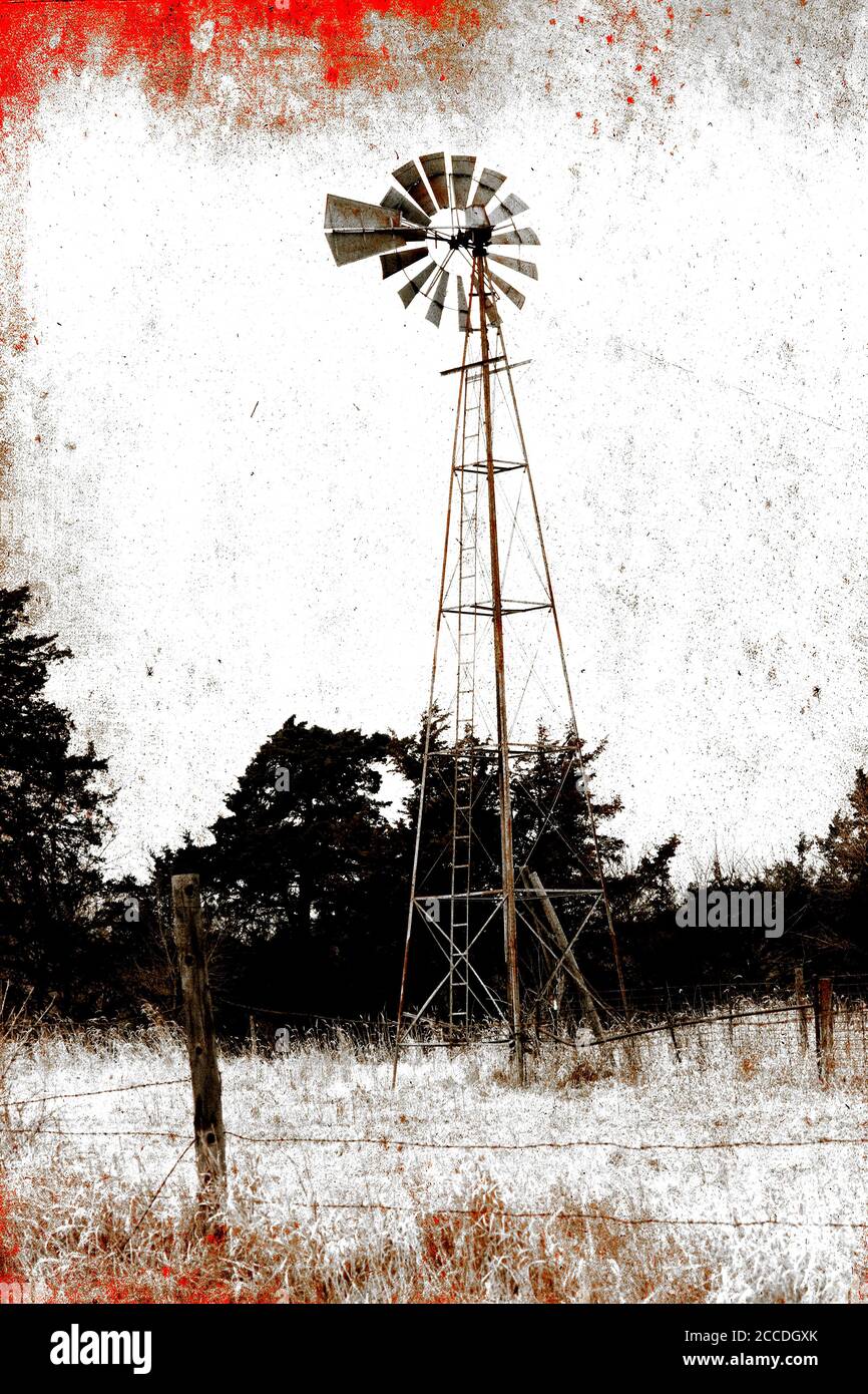 Schwarz-Weiß-Windmühle im Feld Stockfoto