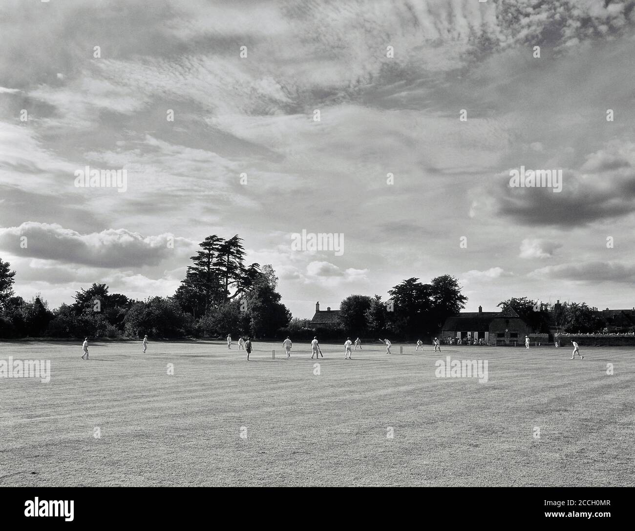 Village Cricket Match, Lacock, Wiltshire, England, Großbritannien Stockfoto