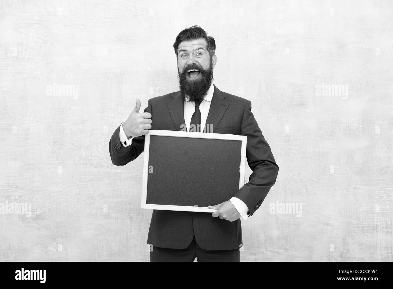 Arbeiten Sie mit Begeisterung. Business Coach halten Tafel. Geschäftspräsentation. Business Academy. Startkonzept. Führungskräfte und Unternehmer haben das Potenzial, die Welt radikal zu verbessern. Stockfoto