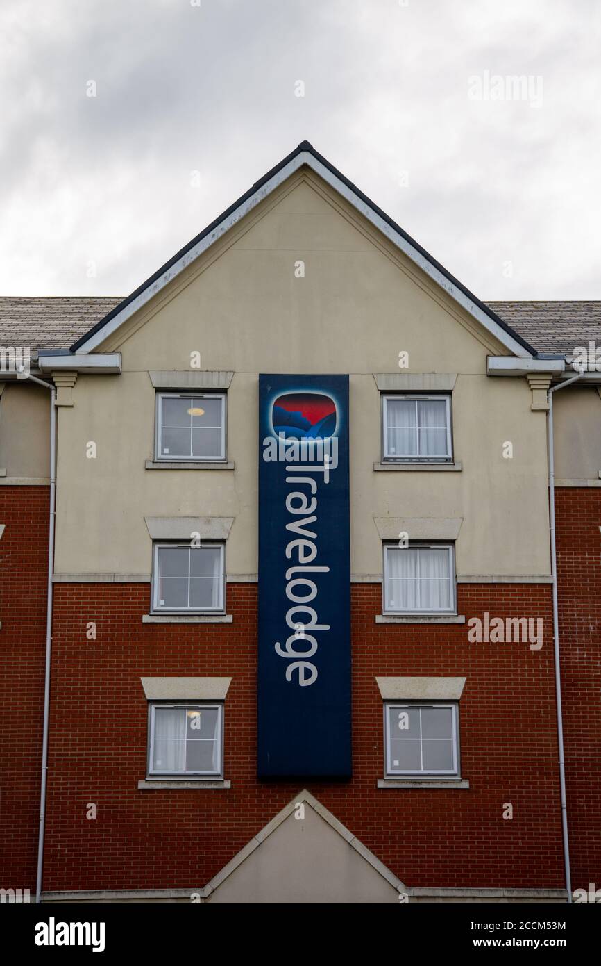 Das Schild an der Außenseite eines Travelodge Hotels Stockfoto