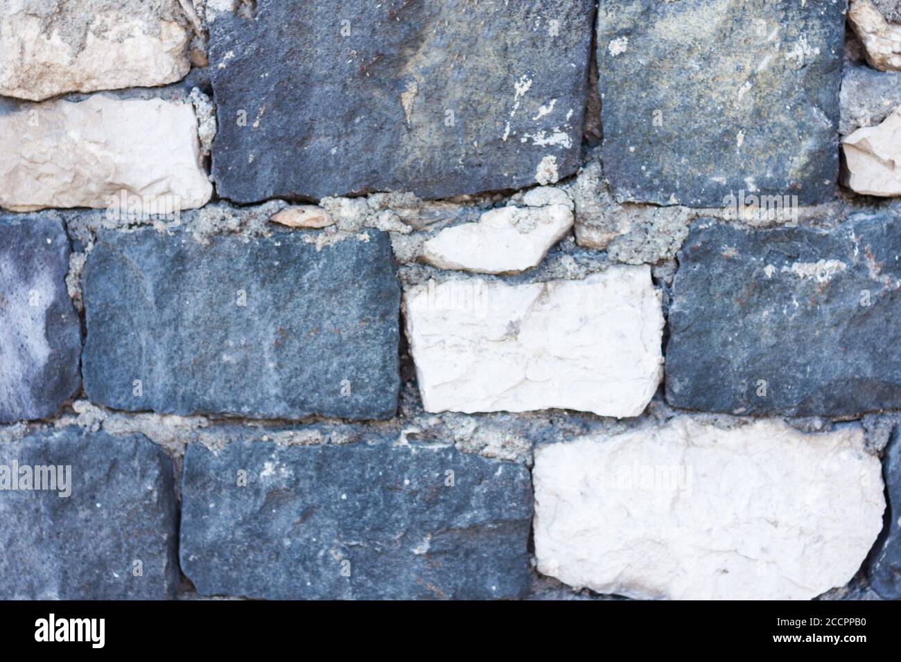 Textur einer Steinmauer eines alten Gebäudes, alte Architektur Stockfoto Textur einer Steinmauer eines alten Gebäudes, alte Architektur Stockfoto