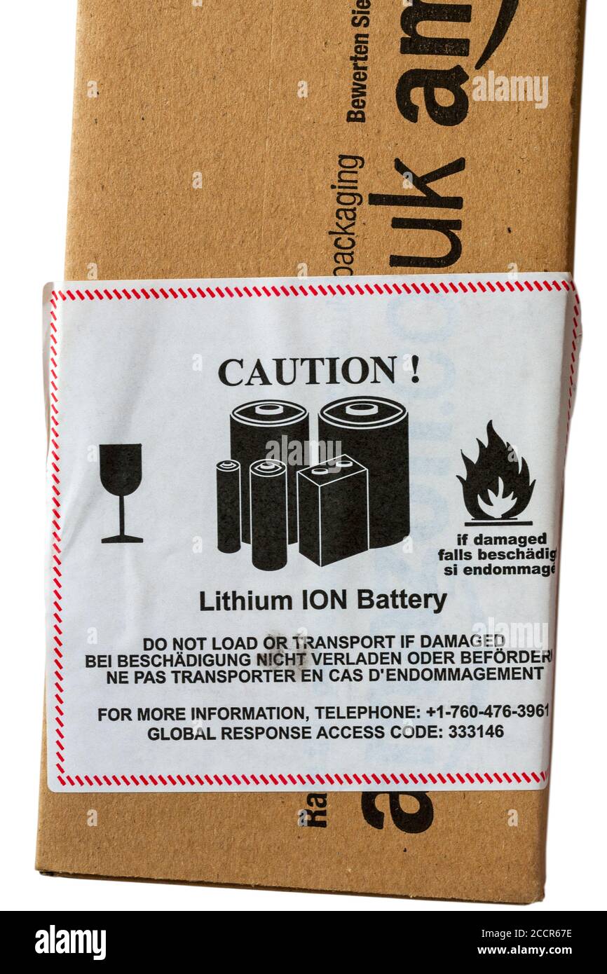 Achtung Lithium-IONEN-Batterie nicht laden oder transportieren, wenn  Beschädigter Aufkleber auf dem Paket von Amazon Stockfotografie - Alamy