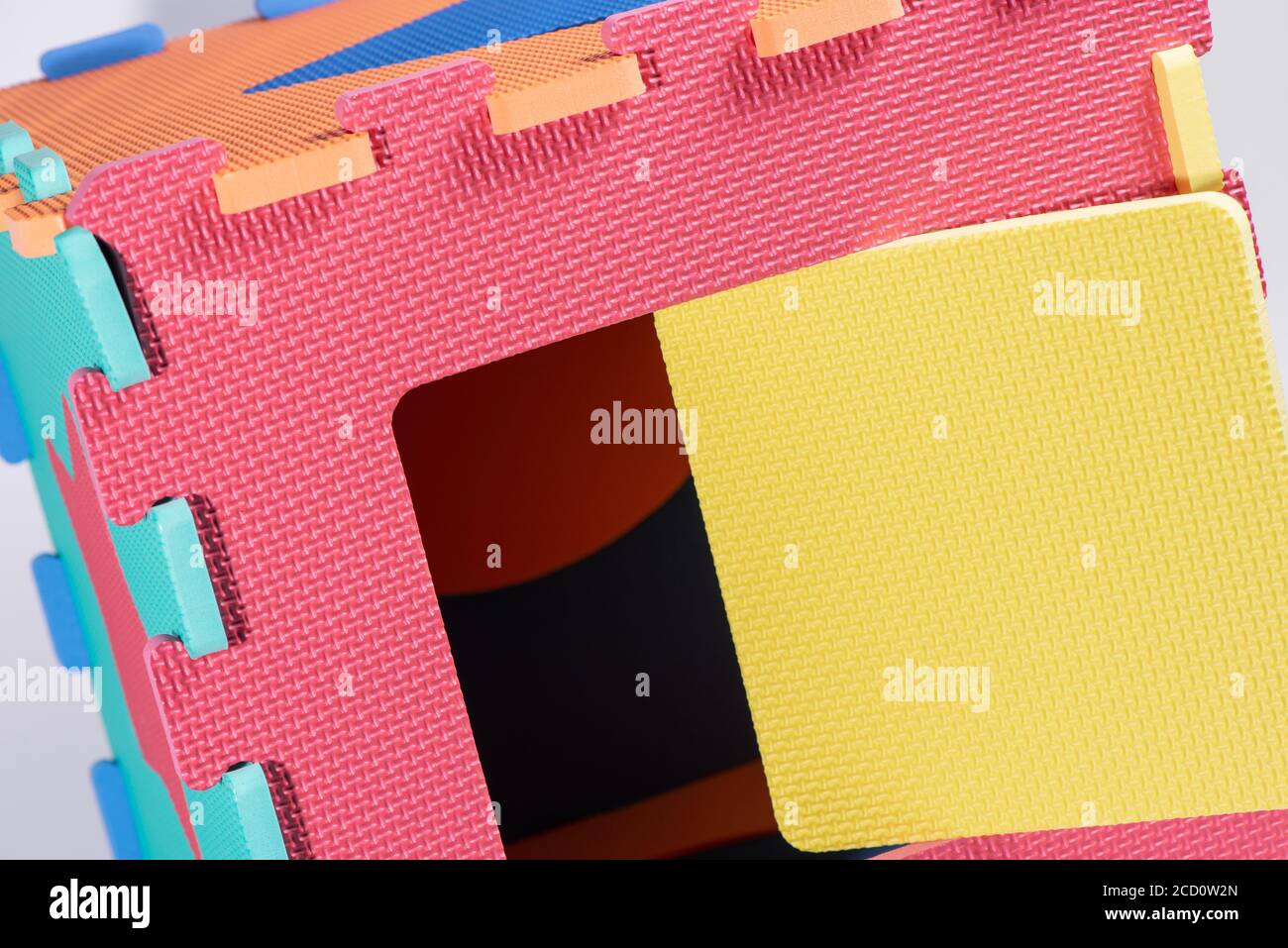Makro-Foto der Details einer Schaum eva. Farbige Gummimatte Puzzle für Kinder. Stockfoto