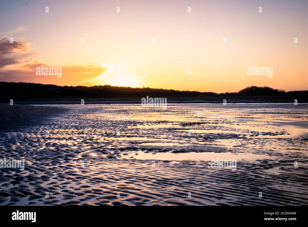 Muster in den Sand am Strand Stockfoto