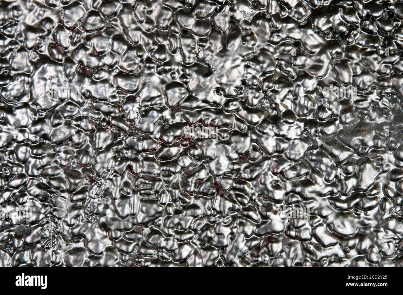 Eine Nahaufnahme EINER Ziegelwand in Metallic Silberfarbe Stockfoto
