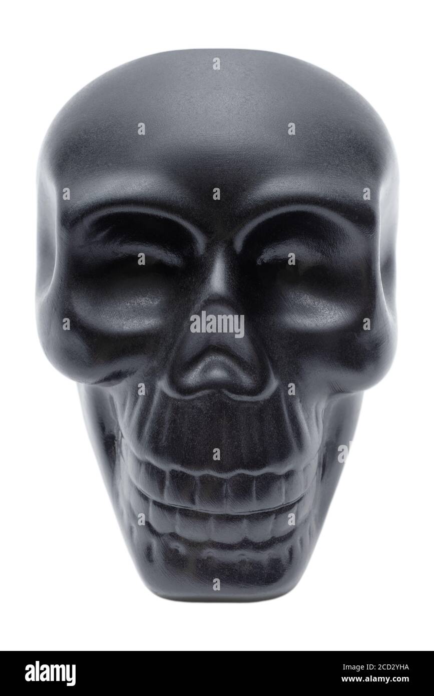 Einzelner schwarzer menschlicher Schädel, Plastikmodell, Souvenir, isoliert auf weißem Hintergrund Stockfoto