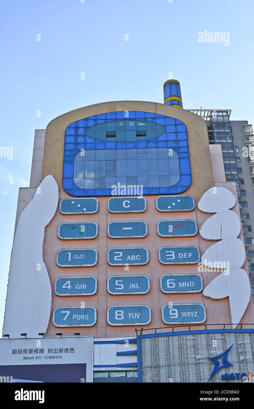 Luftaufnahme des 11-stöckigen 'Handy-Gebäudes' im Stil eines großen Bruders, das war Erbaut in den 1990er Jahren als Einkaufszentrum mit mobilen Telefone und Mob Stockfoto